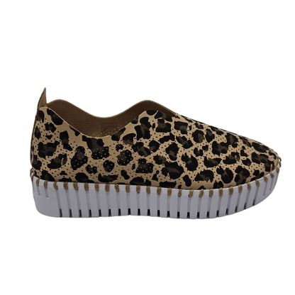 Right facing view of leopard print sneaker with perforated microfibre upper and platform white rubber outsole