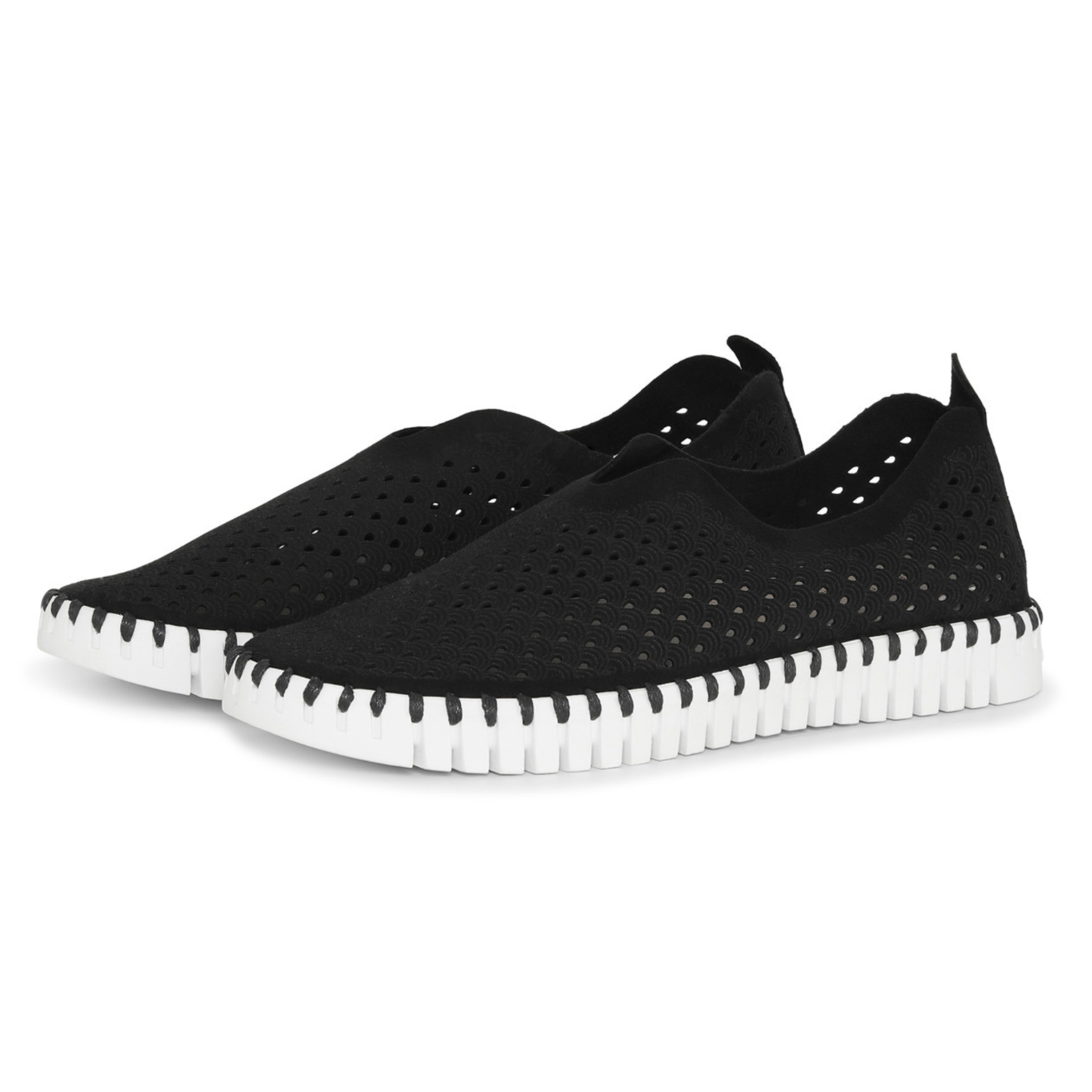 Black slip-on shoes with white sole on a white background