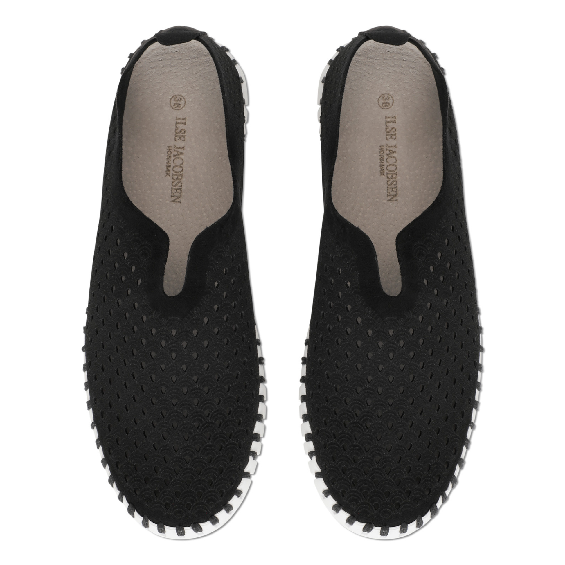 Pair of black slip on shoes with a white outsole