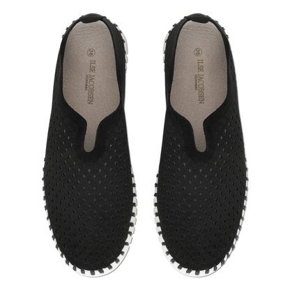 Pair of black slip on shoes with a white outsole