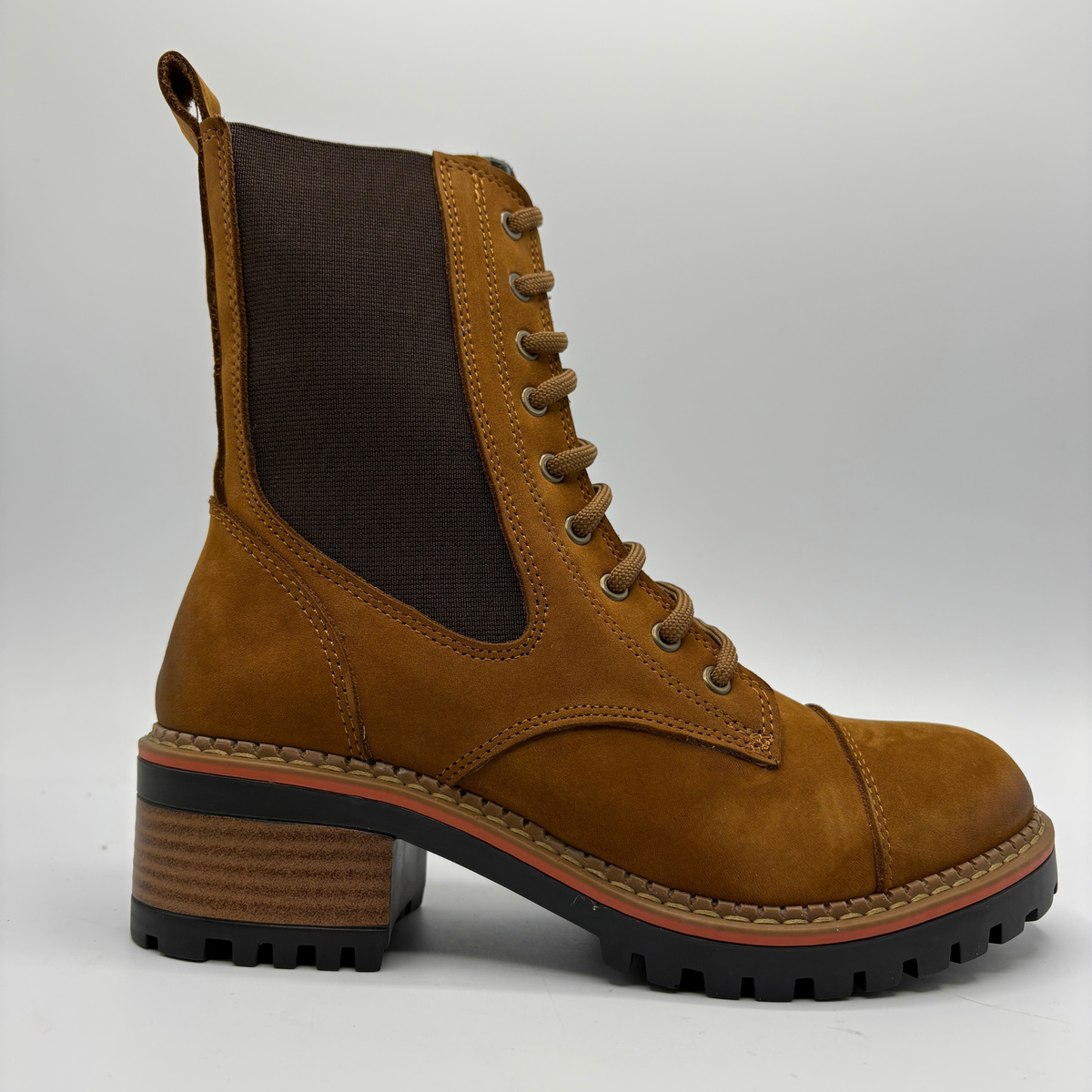 Right facing view of a tan suede boot with a stacked heel, elastic side panel and matching laces
