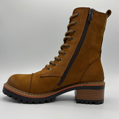 Left view of a tan suede boot with a stacked heel, elastic side panel and matching laces
