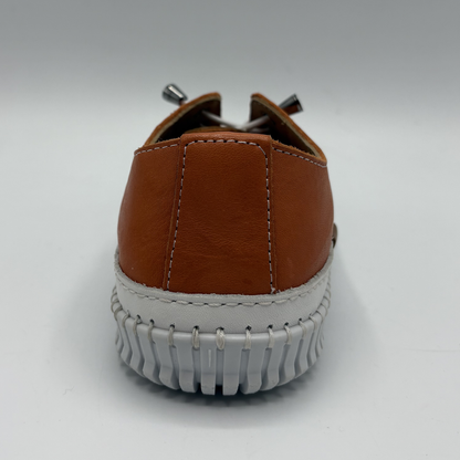 Back view of an orange lace up sneaker