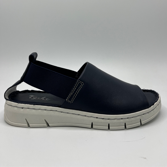 Right facing view of a slip on shoe with elasticated side bands, peep toe and a white rubber outsole.