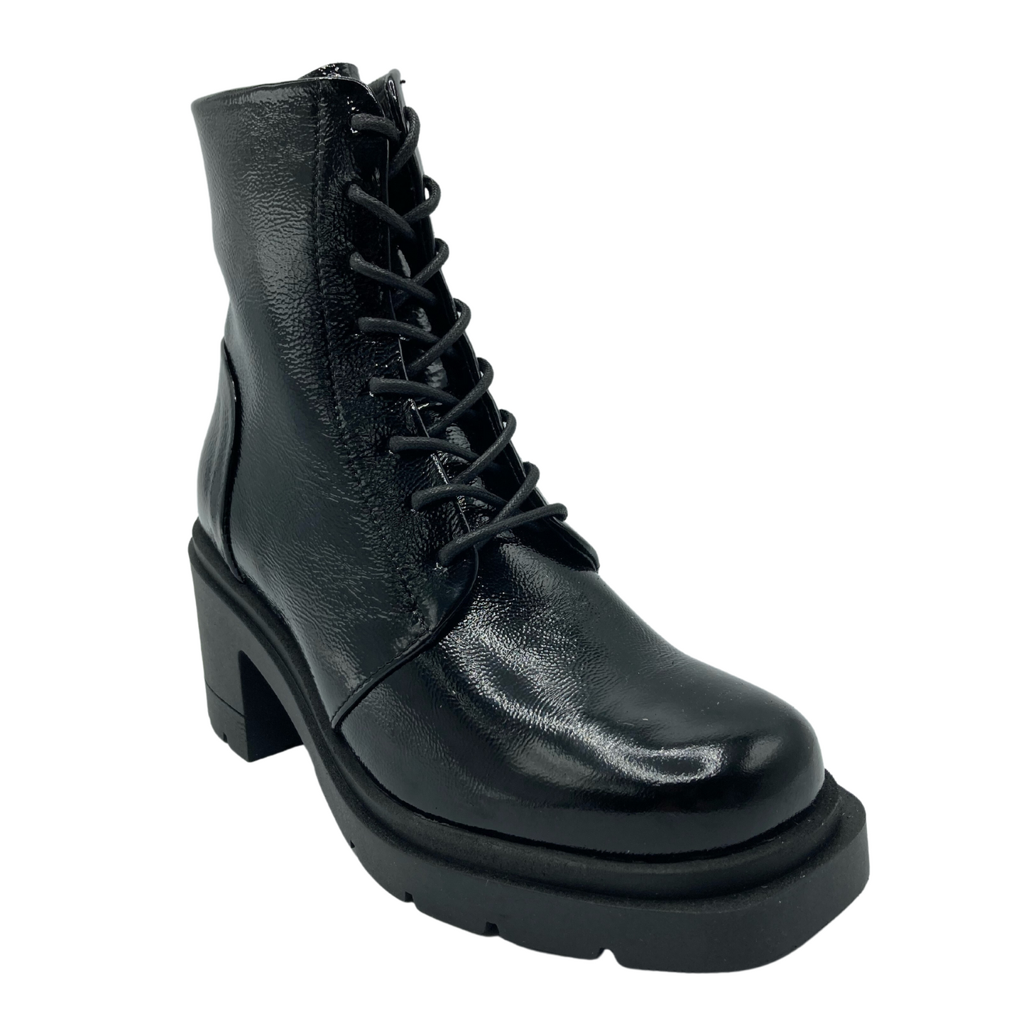 45 degree angled view of black patent leather calf-height boot with matching laces and rubber outsole