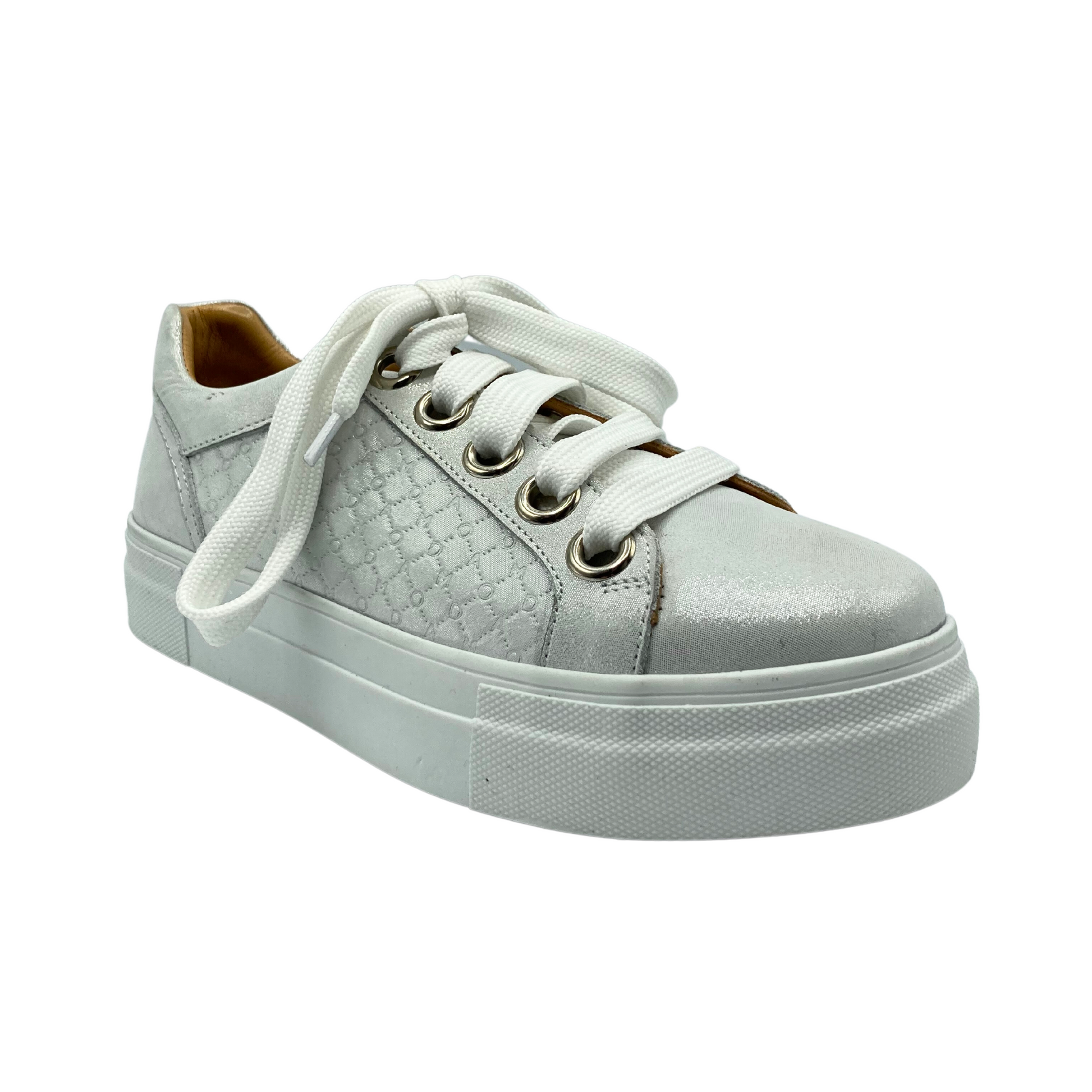 Angled front view of a snazzy sneaker in a glitter grey leather with white laces