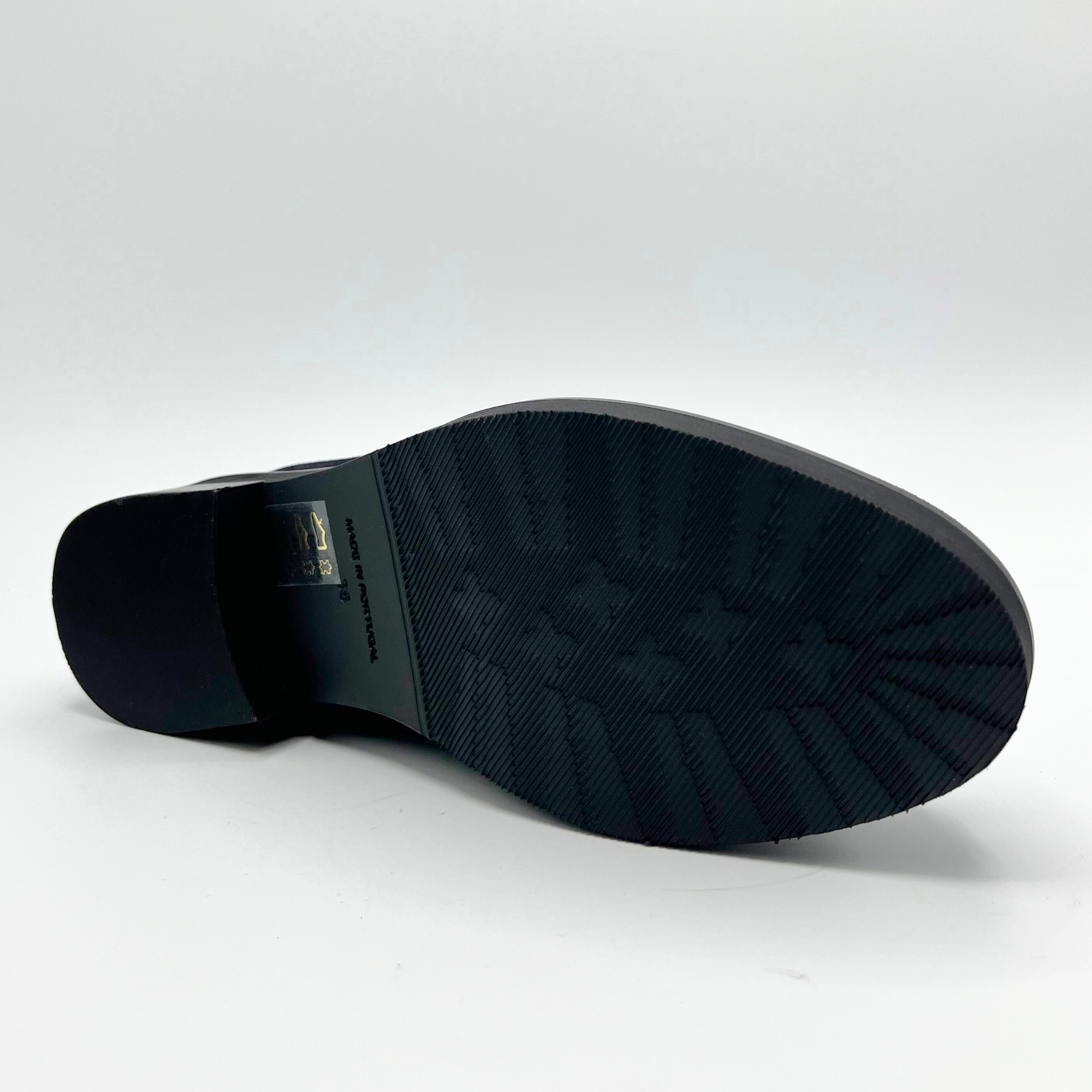 Black shoe sole on a white background