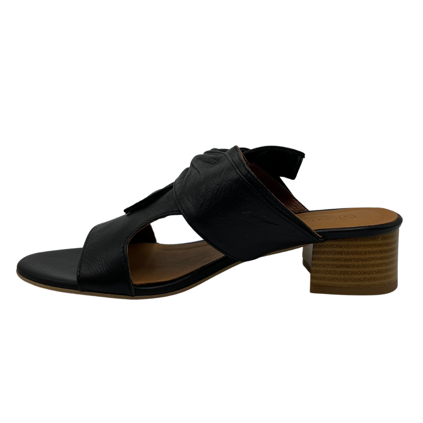 Left facing view of black leather sandal with block heel and knot detail.