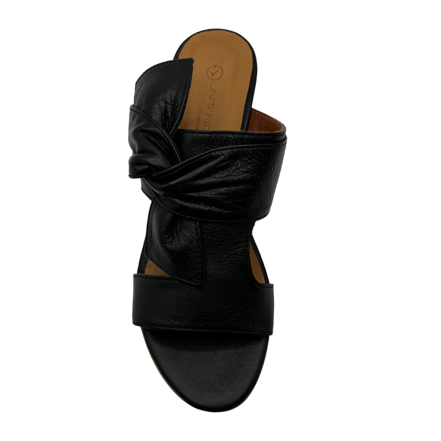 Top view of black leather sandal with block heel and knot detail.