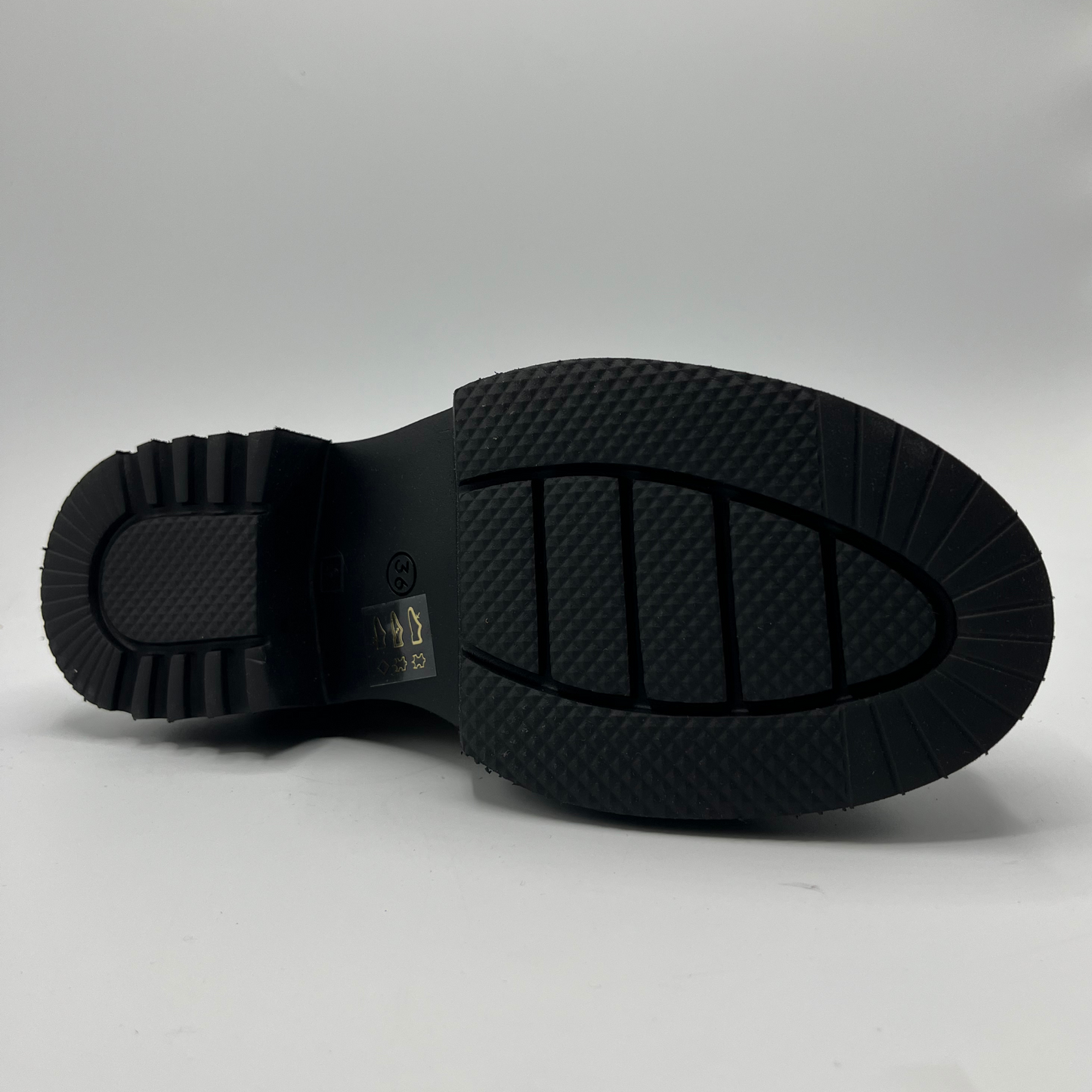 Black sole of a shoe on a white background