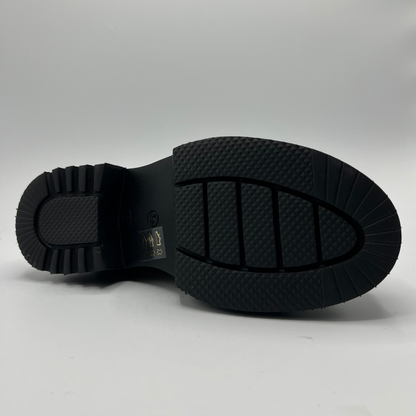 Black sole of a shoe on a white background