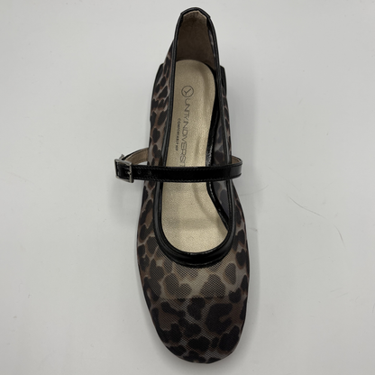 Leopard print shoe with a black strap on a white background