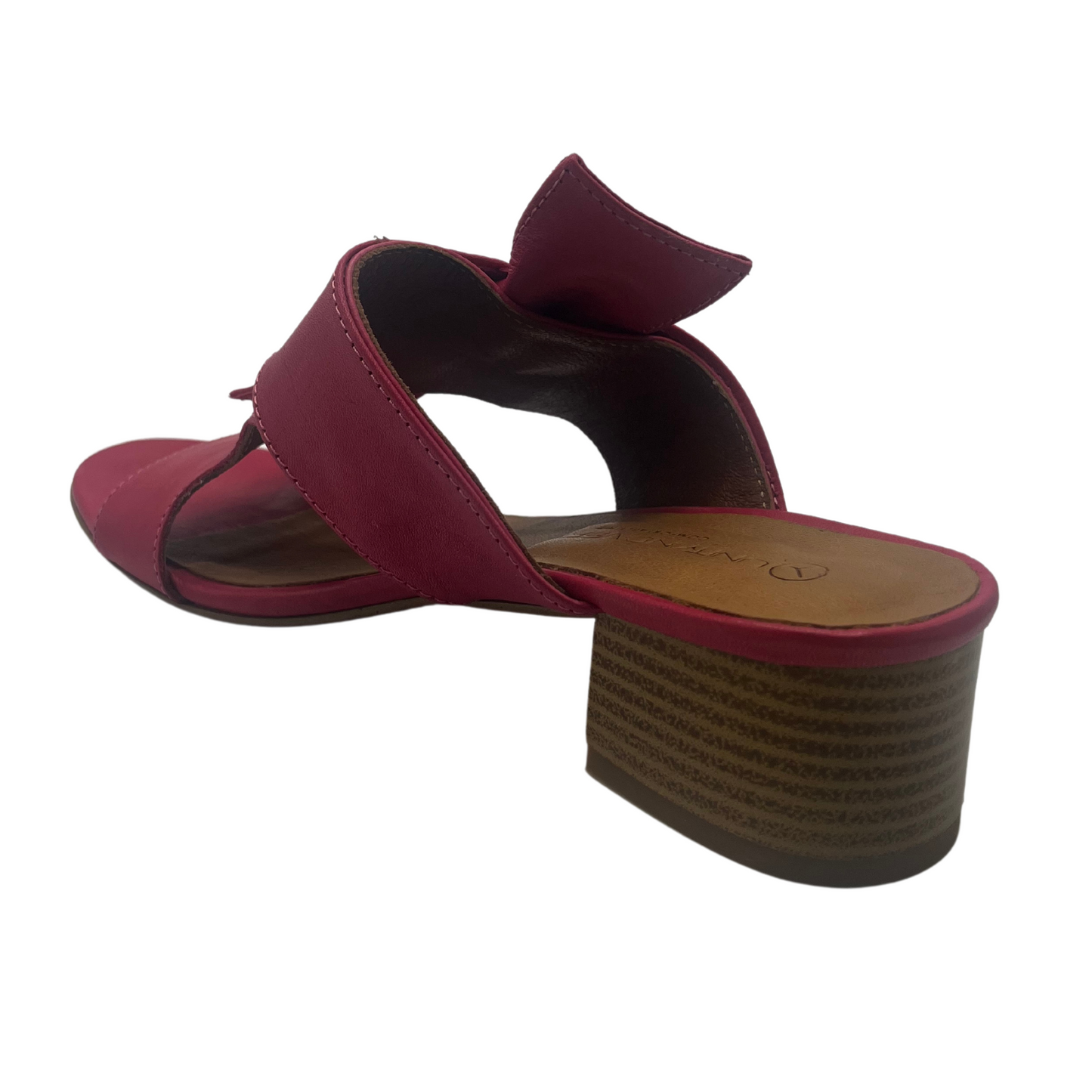 Back view of fuchsia pink leather sandal with block heel, peep toe and knot detail on upper