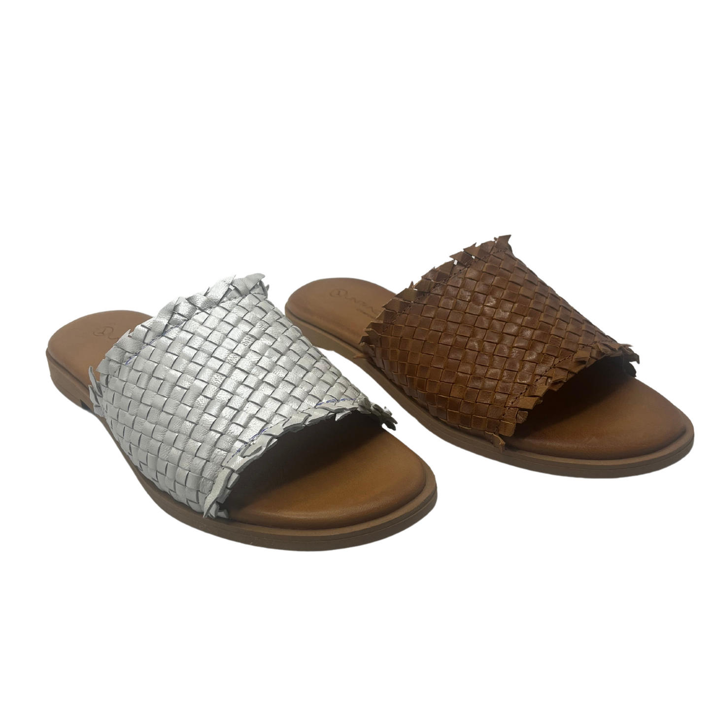 45 degree angled view of two woven leather slip on sandals. The left one is silver and the right one is brown. Both have brown leather footbeds. 