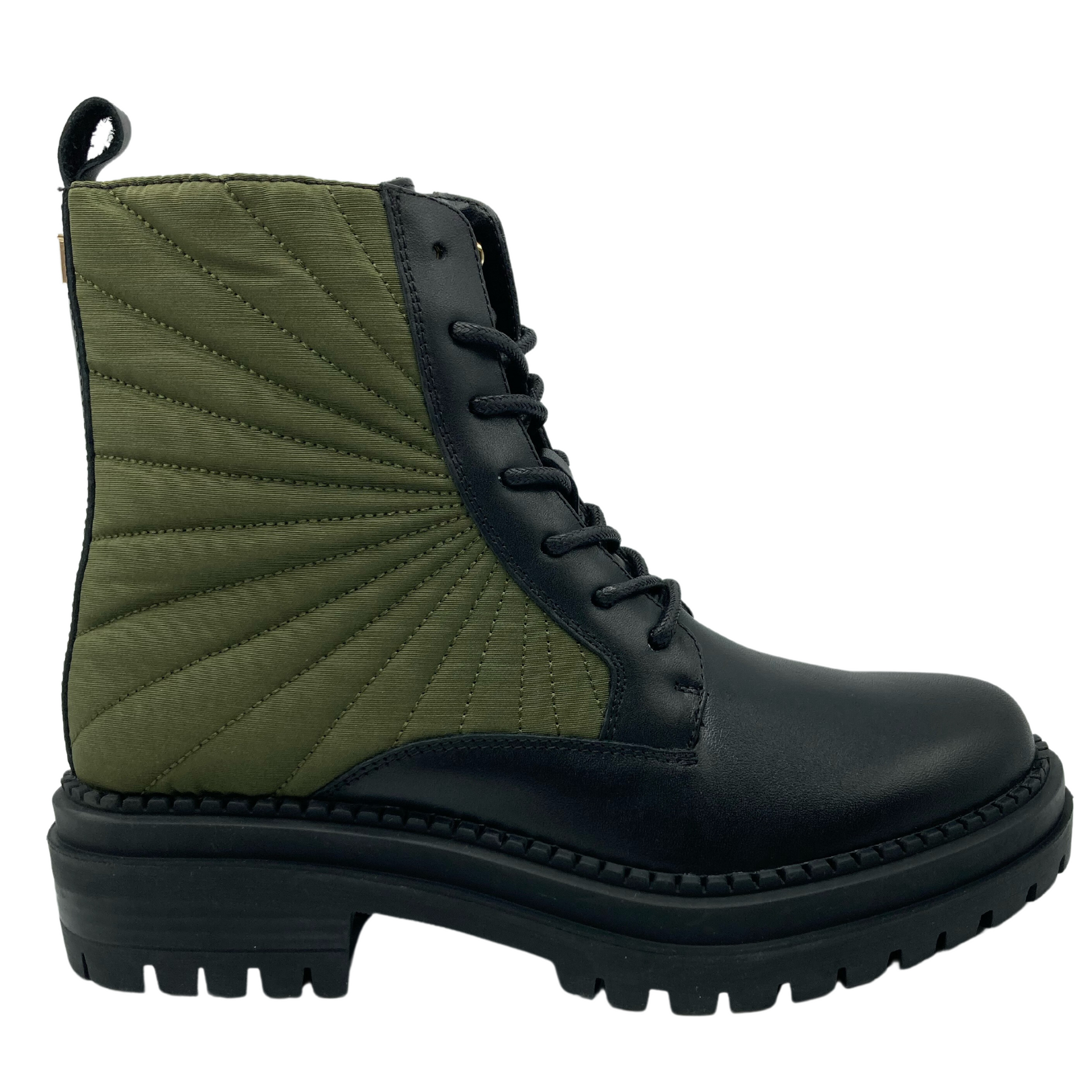 Right facing view of black leather short boot with green textile ankle and black rubber outsole