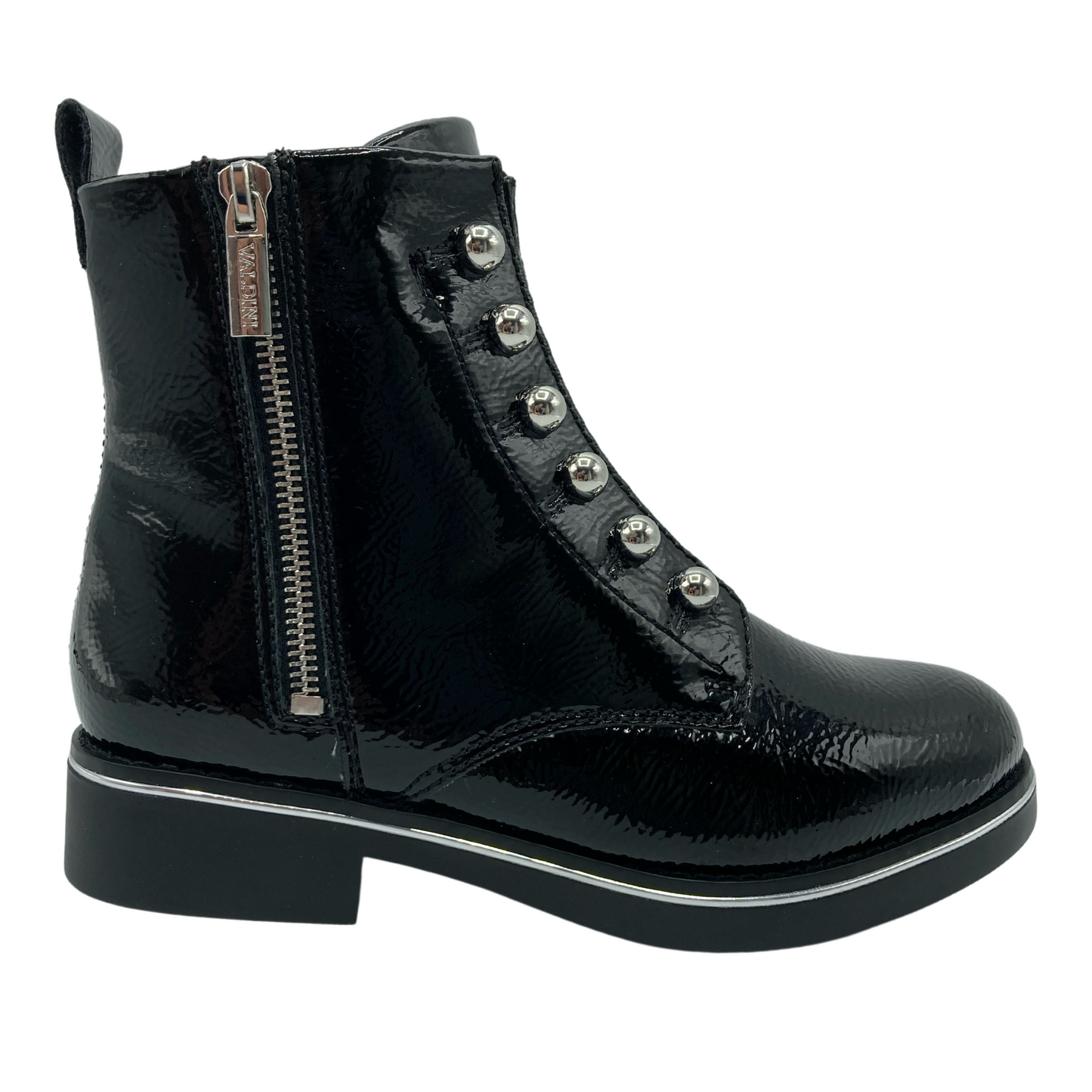 Right facing view of black patent short boot with side zipper closure and pearl buttons up shaft