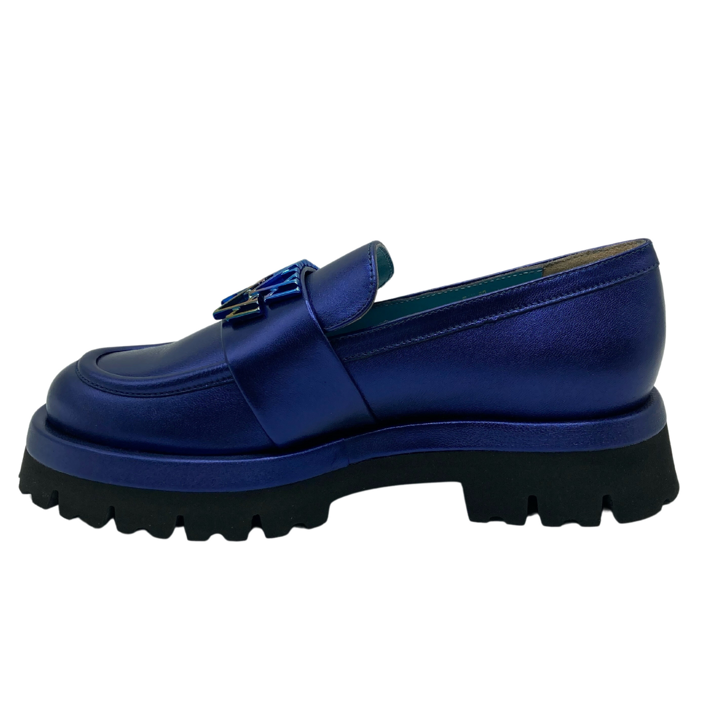 Left facing view of blue leather loafer with rubber lugged sole
