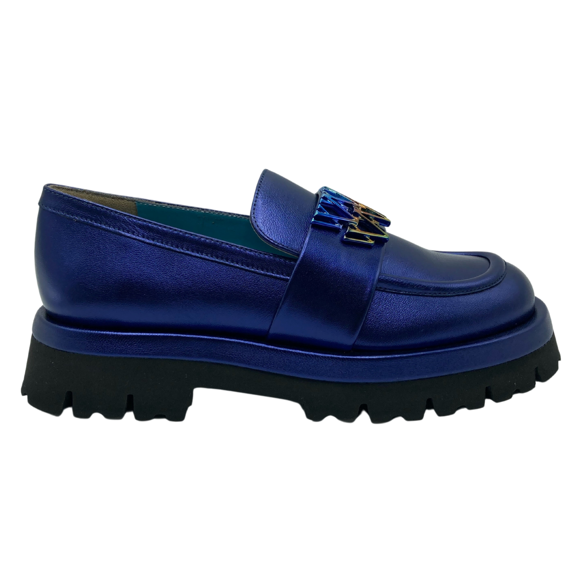 Right facing view of platform blue leather loafer with multicoloured detail on the upper