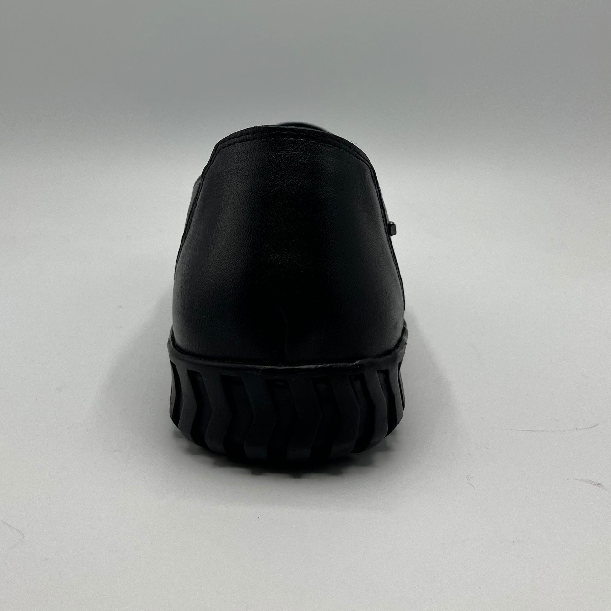 Black shoe on a white background