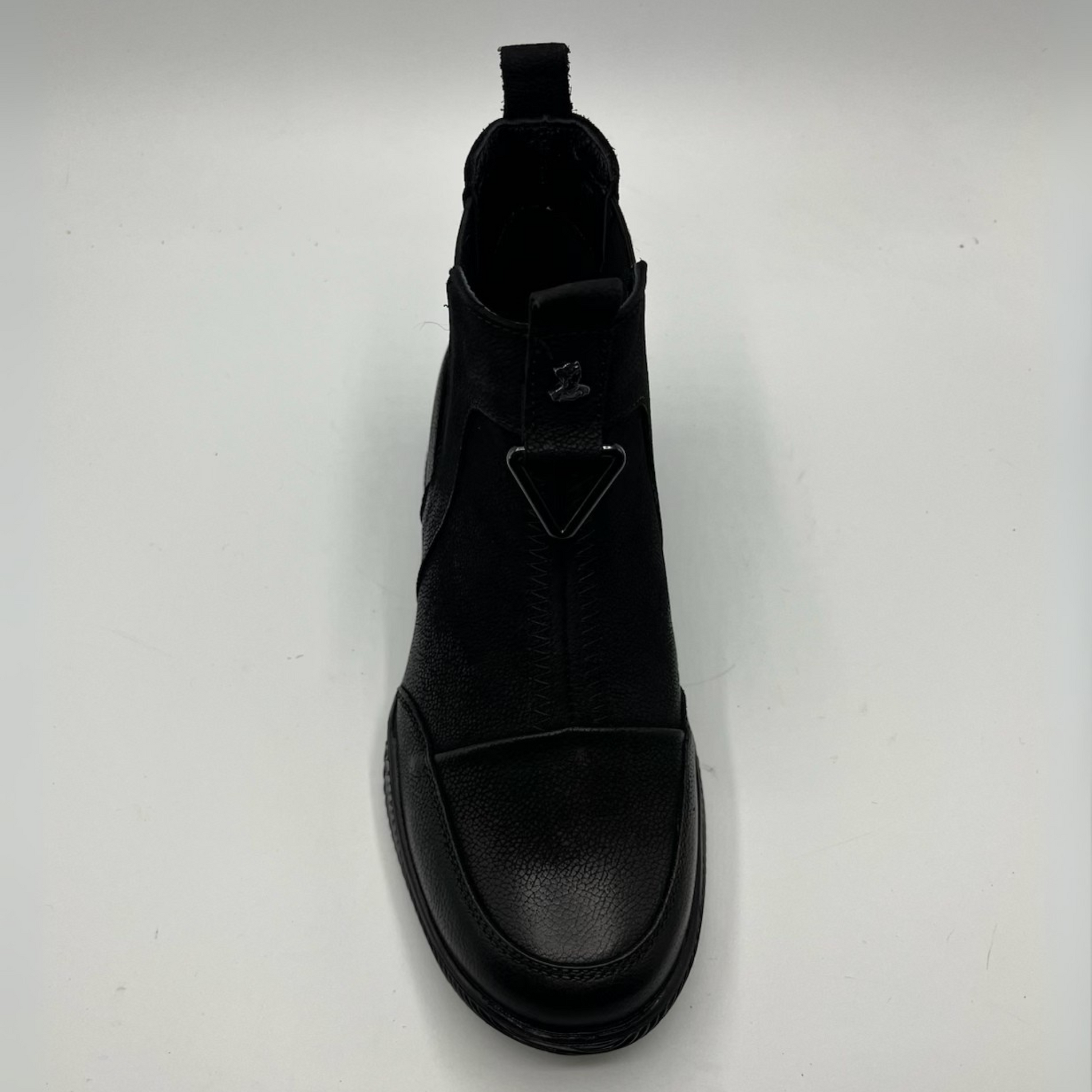 Black boot on a white background