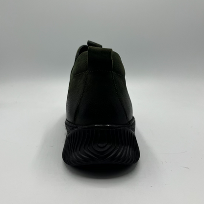 Dark green shoe on a white background