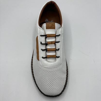 White shoe with brown accents on a light gray background