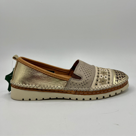 Right facing view of a leather slip on sport moccasin with metallic god accents and a perforated pattern on the toe box. 