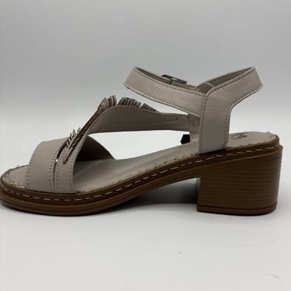 Beige sandal with a brown block heel on a white background