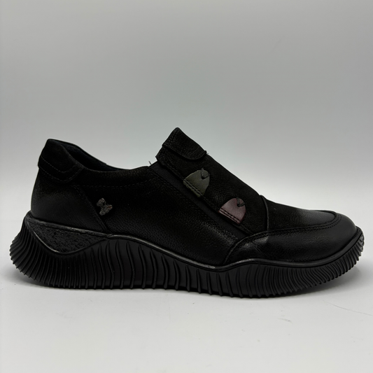 Right facing view of a black leather sneaker with a supportive outsole