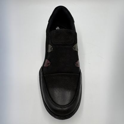 Top facing view of a black leather sneaker with a supportive outsole