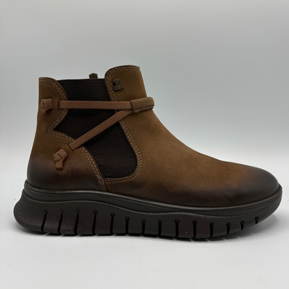Right facing view of a brown leather chelsea boot with an elastic side gore and inside zipper