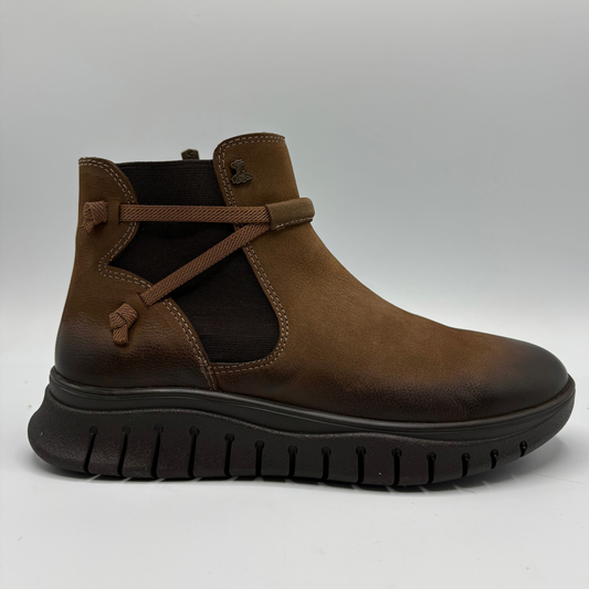 Right facing view of a brown leather chelsea boot with an elastic side gore and inside zipper