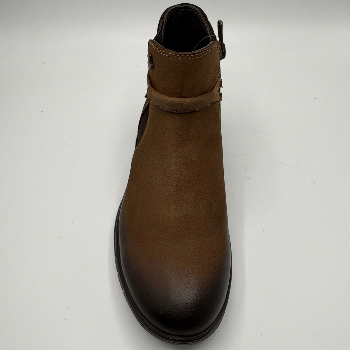 Front view of a brown leather chelsea boot with an elastic side gore and inside zipper