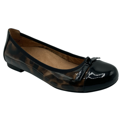 45 degree angled view of black and leopard print ballet flat with rubber sole