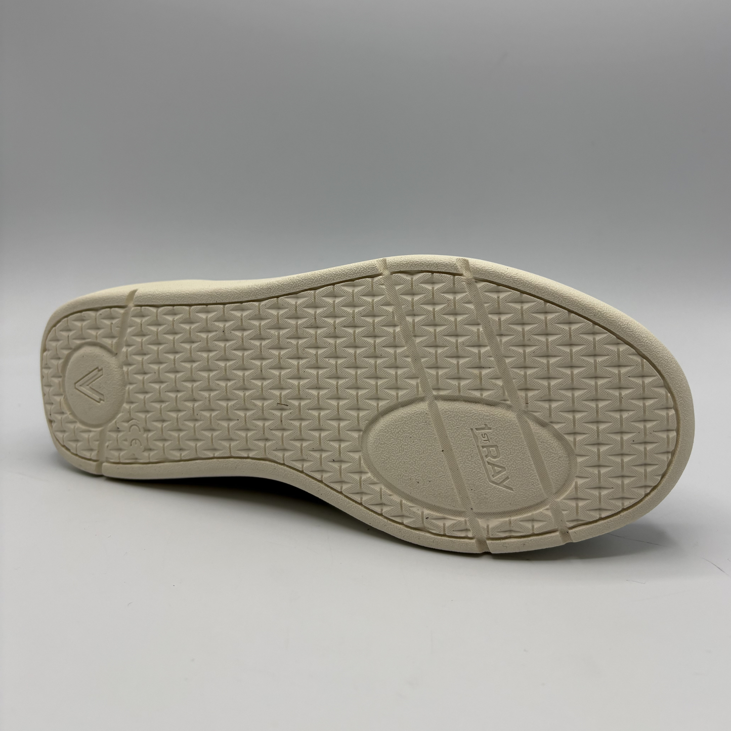 Bottom view of an Olive coloured sneaker with a side zipper