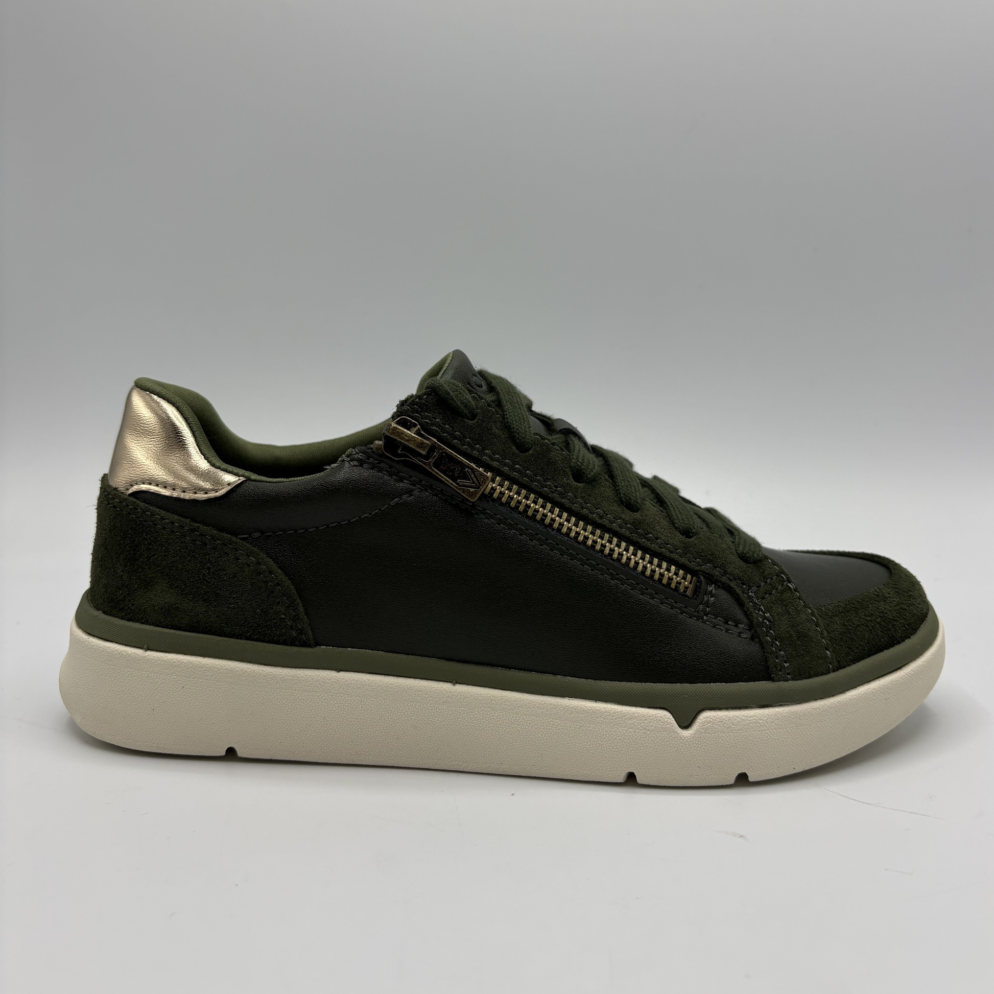 Right facing view of an Olive coloured sneaker with a side zipper