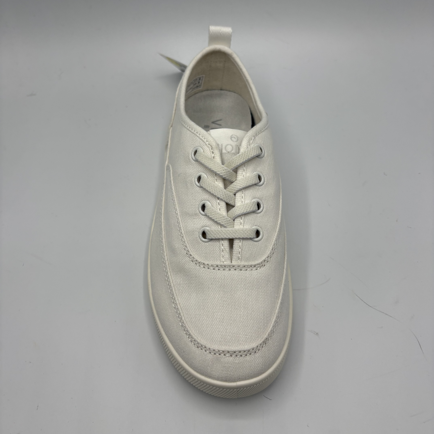 White sneaker on a gray background
