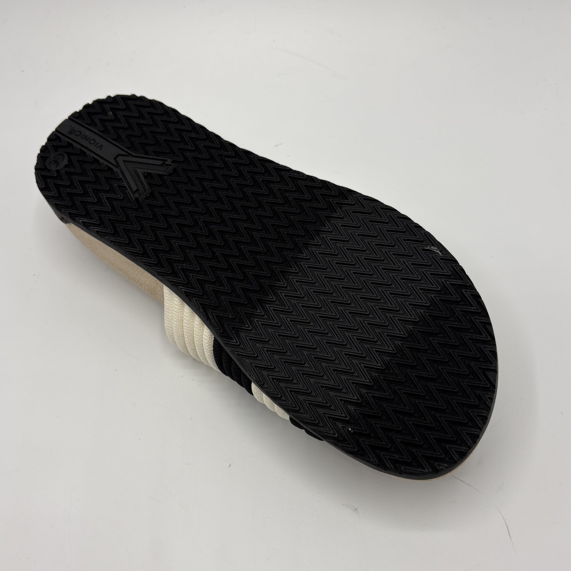 Black sole of a shoe on a white background