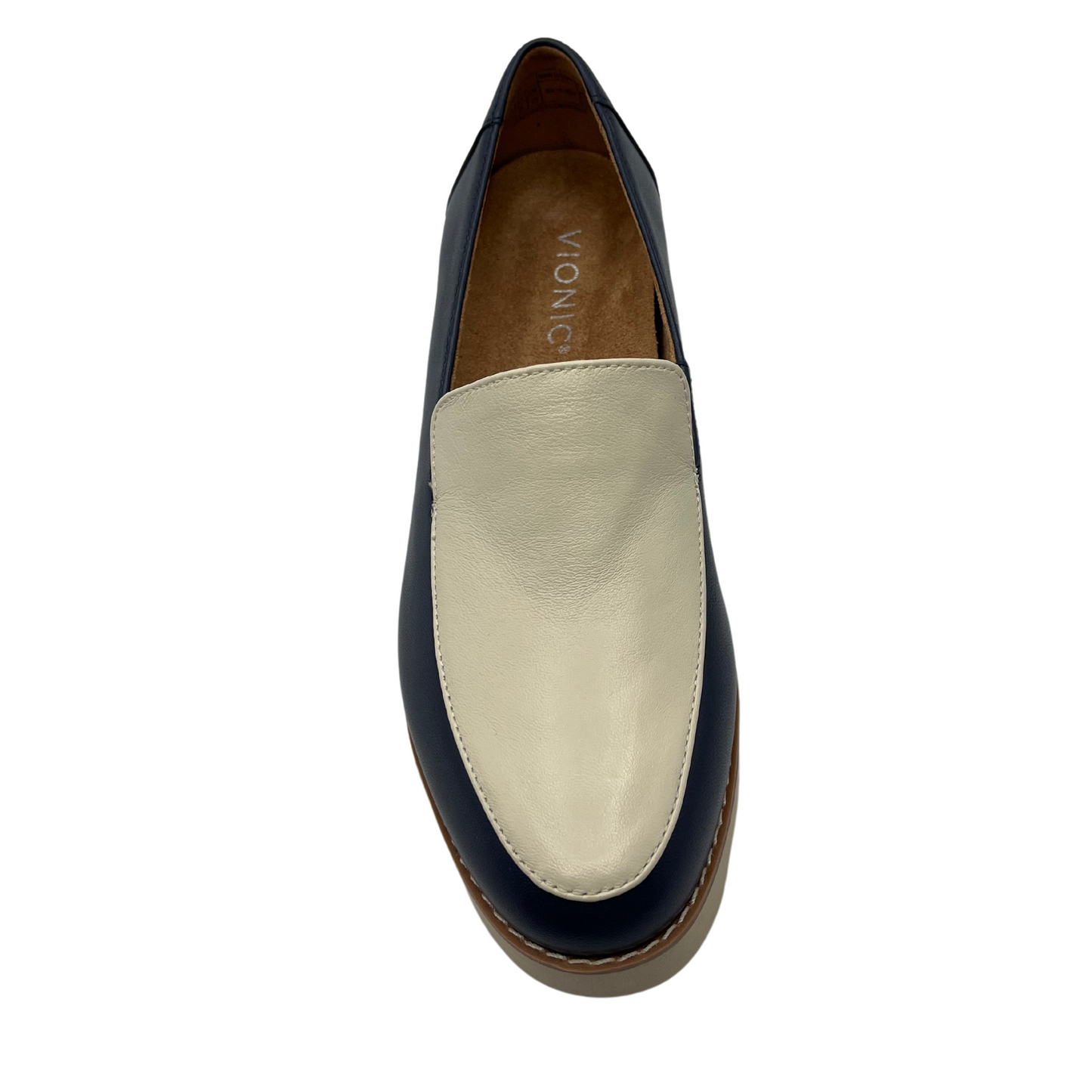 Top view of navy and cream leather loafer with leather lining and chunky rubber sole