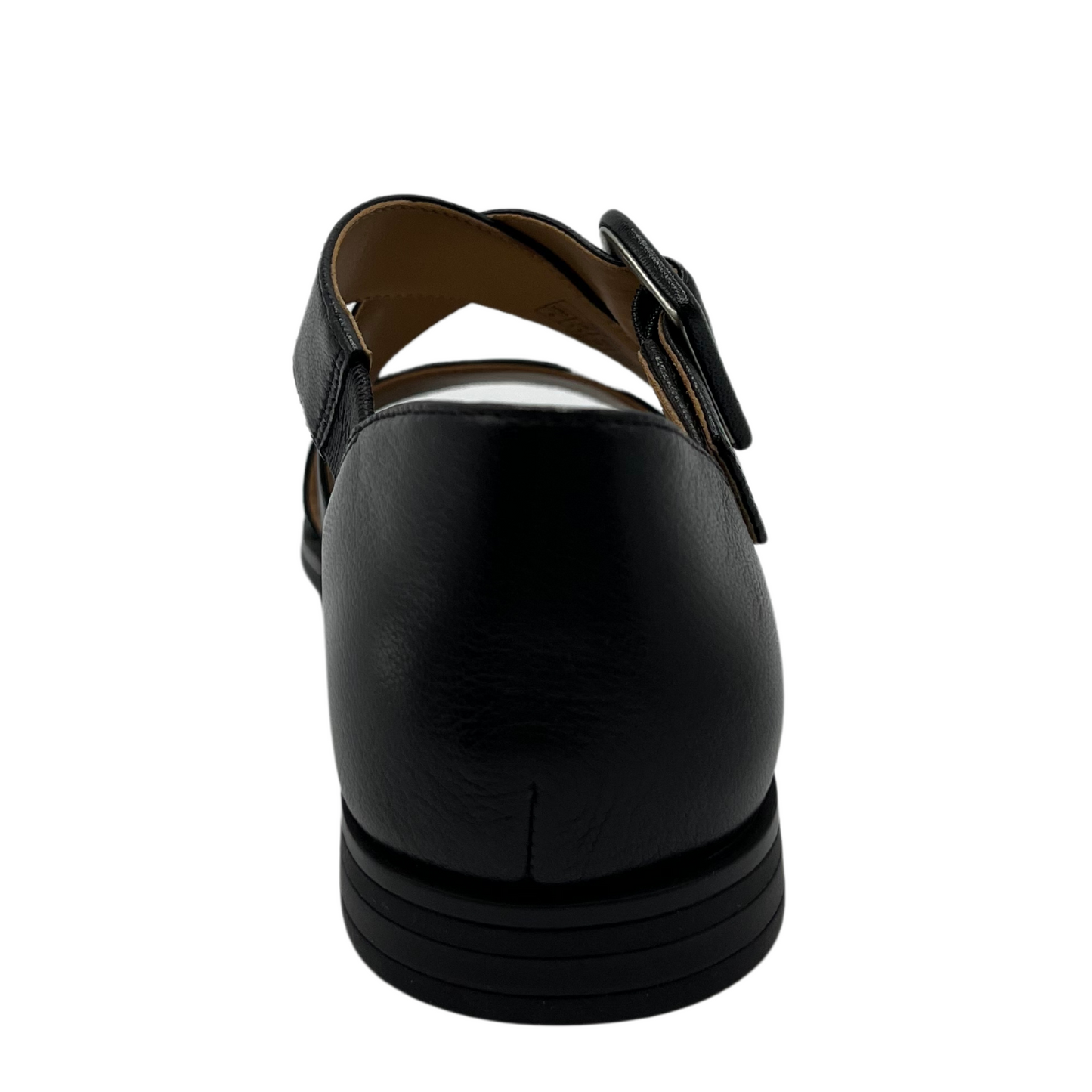 Back view of black leather sandal with low heel and matching buckle
