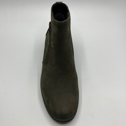 Green ankle boot on a white background