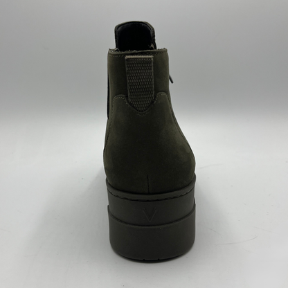 Dark green ankle boot on a white background