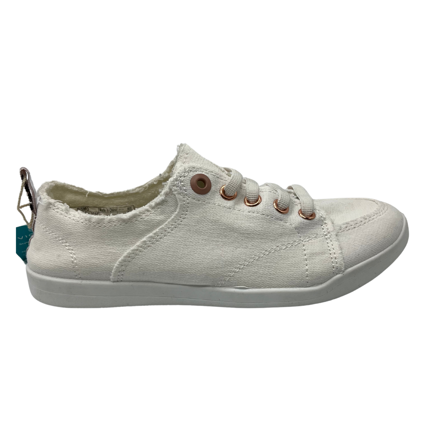 Right facing view of white canvas shoe with white rubber outsole and white laces