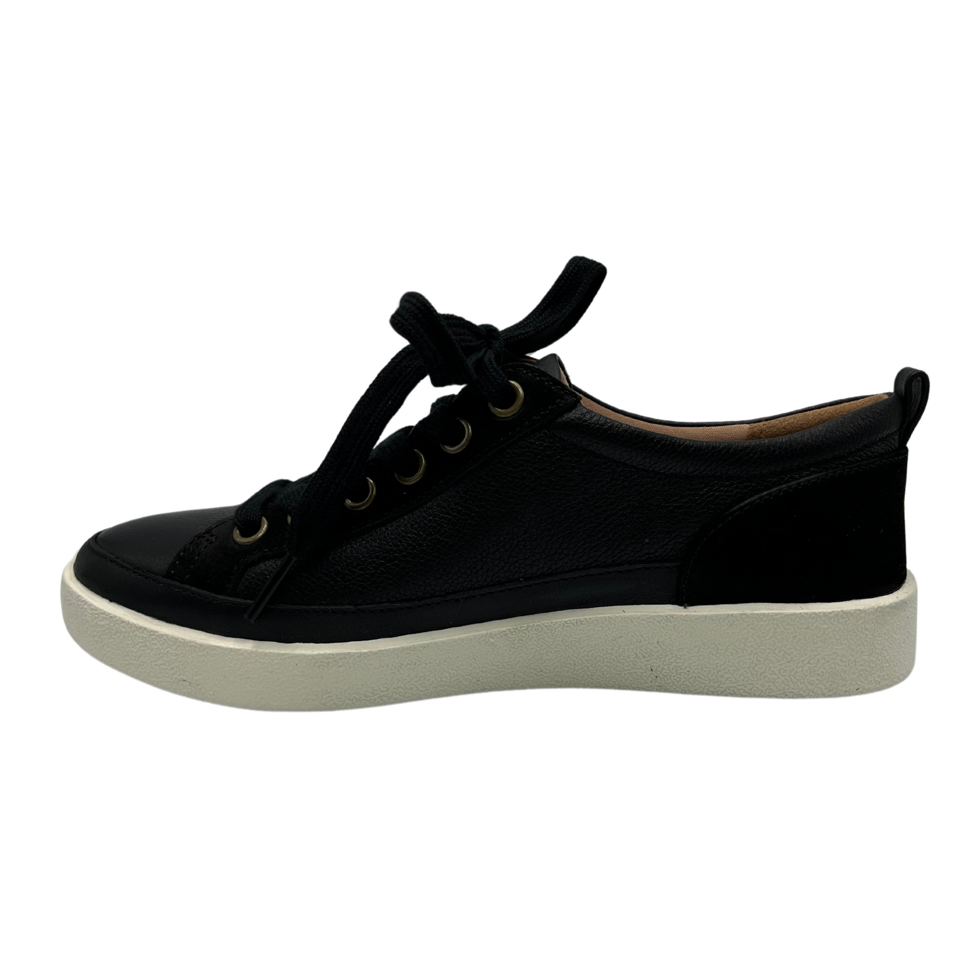 Left facing view of black nubuck leather and suede sneaker with matching laces and white rubber outsole