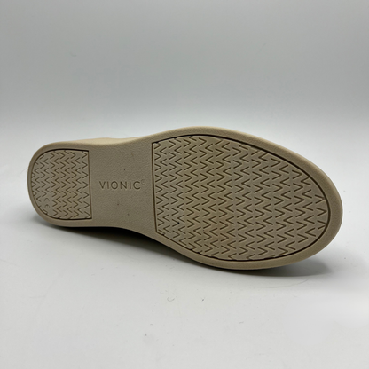 Tan shoe sole with 'Vionic' branding on a white background