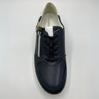 Top view of a navy leather sneaker with a white rubber outsole with laces and a side zipper closure.