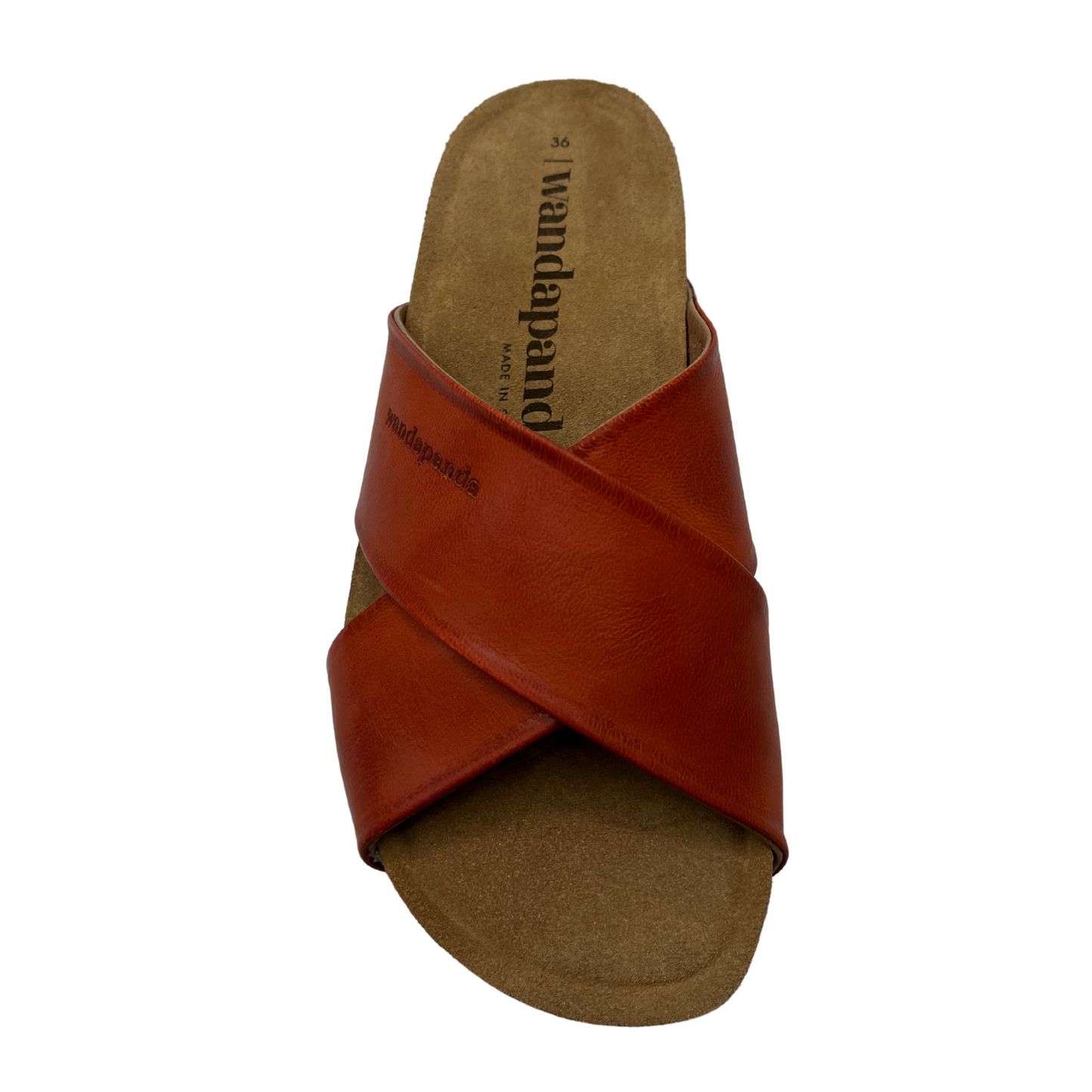 Top view of red leather sandal with cross straps on the upper
