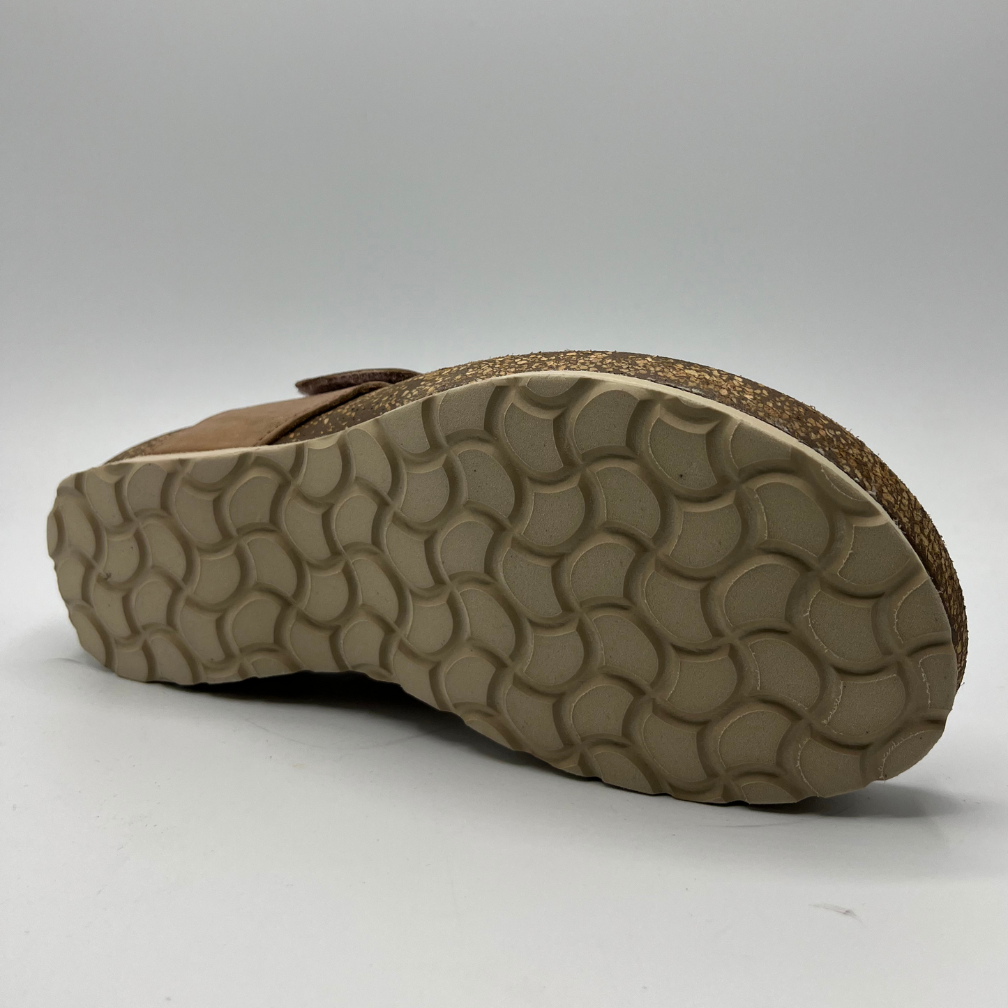 Bottom view of beige leather sandal with cork footbed 