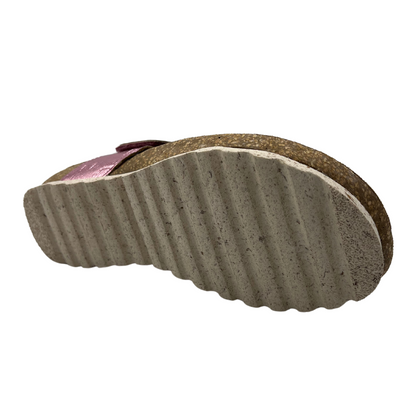 Bottom view of pink leather sandal with cork footbed