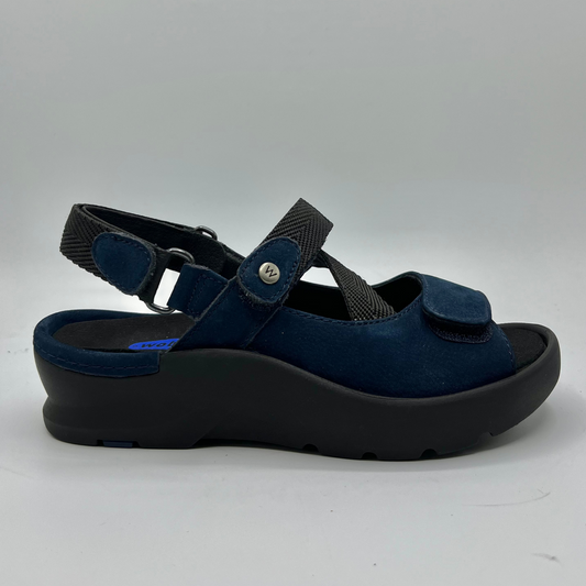 Right facing view of a navy coloured sandal with braided style adjustable straps.